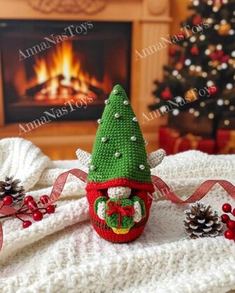 Сhristmas gnome Elf with a gift