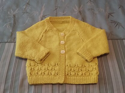 Everly's yellow cardigan