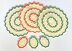 Oval placemat and coaster set by HueLaVive