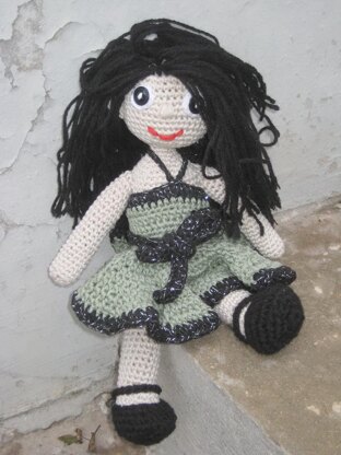 Crochet doll in olive green dress