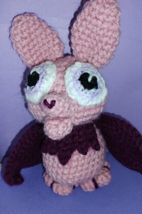 Sister and Baby Brother Bat – hanging in a tree, reading upside down. Try crocheting them right side up!