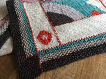 Alice The 4th knitted cosy blanket