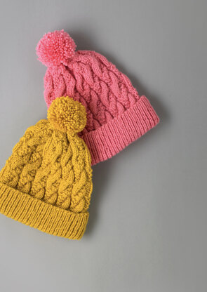 Modern Cable Hat - Free Knitting Pattern for Women in Paintbox Yarns Simply Aran by Paintbox Yarns