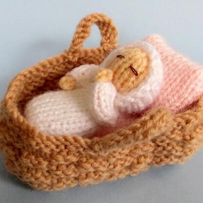 Tiny Baby Doll in a Basket Crib
