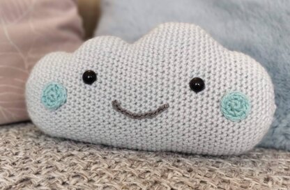 Cloud pillow and mobile with raindrops