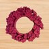 A crochet flower scrunchie