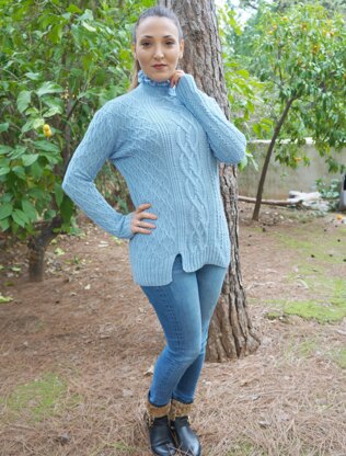 Ruffled neck cabled sweater