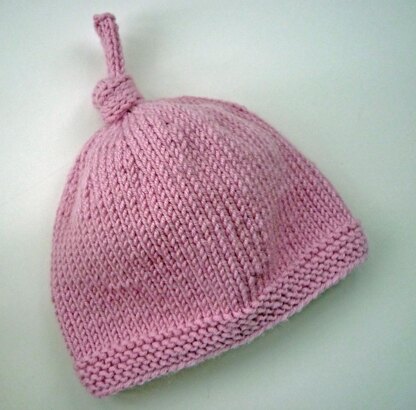 Tegan Baby Hat with Top Knot Knitting pattern by Julie Taylor