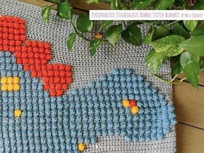 Personalised Stegosaurus Bobble Stitch Blanket by Melu Crochet