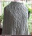 Cabled poncho with cuffs