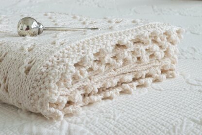 Cloverleaf Eyelet Baby Blanket Knitting Crochet pattern by Nourish