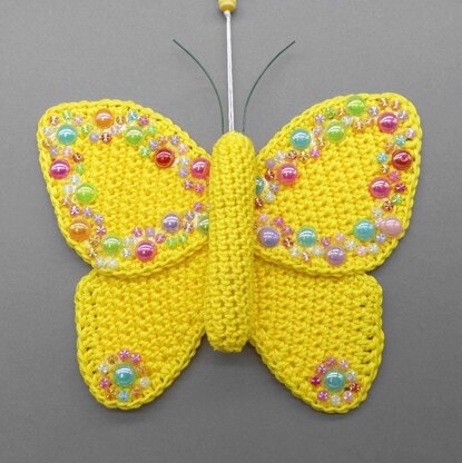 Butterfly hanging decoration - simple made from scraps of yarn