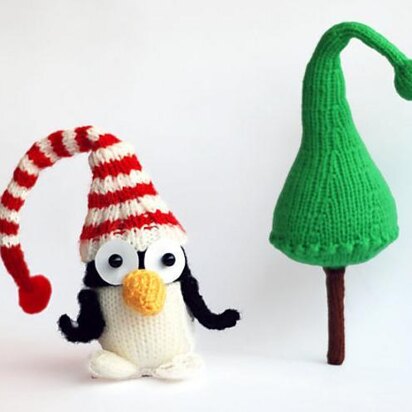 New Year Penguin in hat with Christmas tree