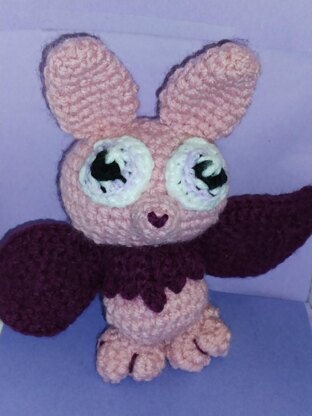 Sister and Baby Brother Bat – hanging in a tree, reading upside down. Try crocheting them right side up!