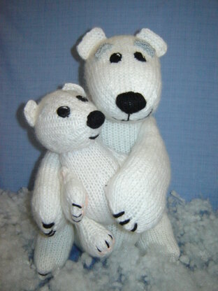 Knitted bear with a bear cub. What are the buttons for?