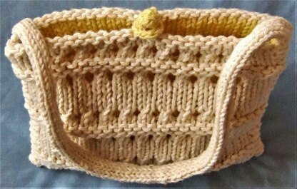 Reversible Eyelet Bag & Clutch