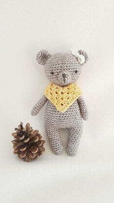 Bear with poncho and bow