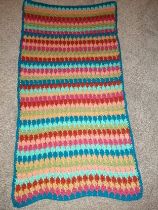 Larksfoot blanket with and without a border