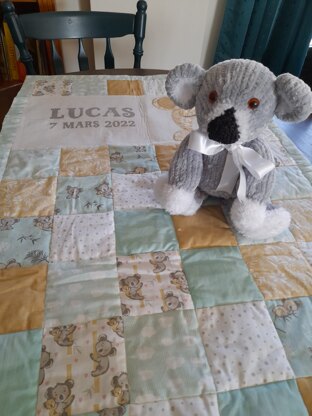 Patchwork quilt and koala bear