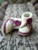 Baby bootie with split cuff and flower detail