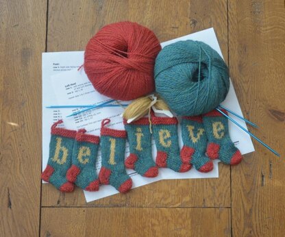 BELIEVE Set of 7 Christmas Stocking Ornaments
