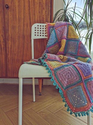 Energy Boosting Granny Square blanket in gradient ombre yarn