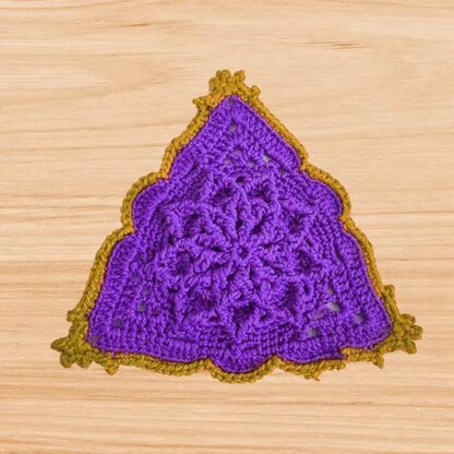 A crochet triangle motif