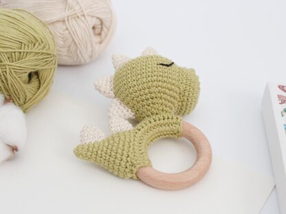 Crochet dinosaur baby teether rattle toy amigurumi pattern