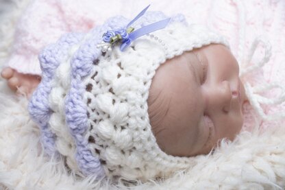 Newborn baby Aran bonnet crochet pattern with 4 finishes