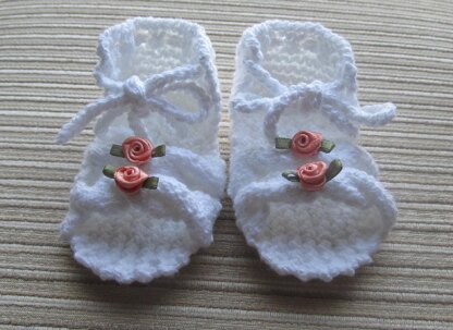 Knitted Sandals with Cables for a Baby Girl