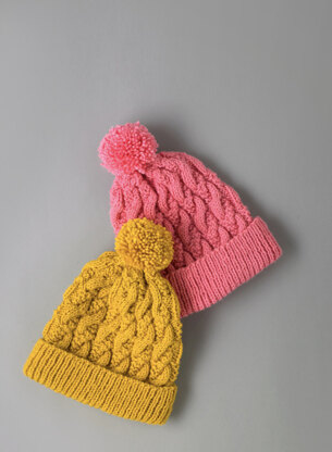 Modern Cable Hat - Free Knitting Pattern for Women in Paintbox Yarns Simply Aran by Paintbox Yarns