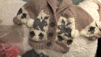 Baby cowichan sweater with bunnies and hedgehog