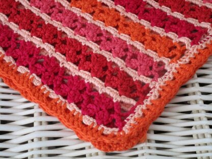 "Simply in red” baby blanket