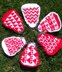 Six knitted coin purses