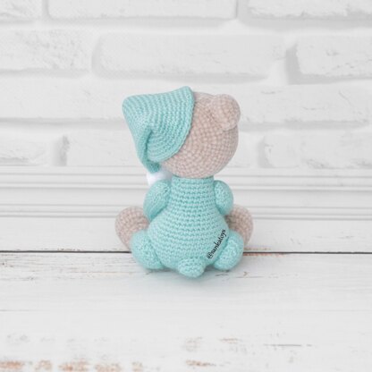 Plush bear in sleepwear