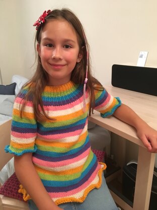 Colourful girl's ruffled top