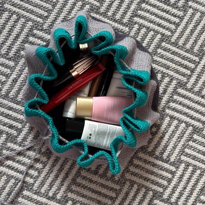 'Flat out' make-up bag