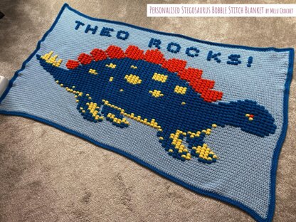 Personalised Stegosaurus Bobble Stitch Blanket by Melu Crochet