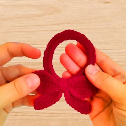 A crochet scrunchie bow