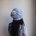 Slouchy hat with pom pom