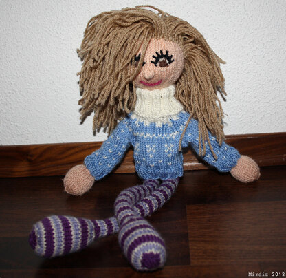 Arne and Carlos' Knitted Dolls with a Designer Wardrobe