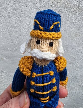 Knitted nutcracker doll
