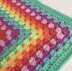 Happy Rainbow Granny Square Blanket