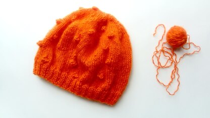 Pure wool orange hat with bobbles