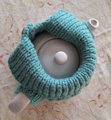 Aran jacket tea cosy