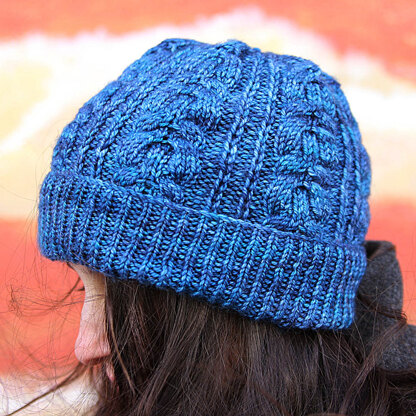 "Whiskey Highball Cable Hat by Thea Colman" - Hat Knitting Pattern in The Yarn Collective
