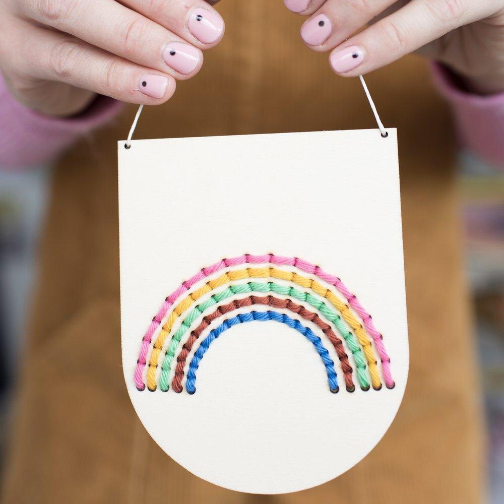 Made a little pastel rainbow badge from embroidery thread. : r/crochet