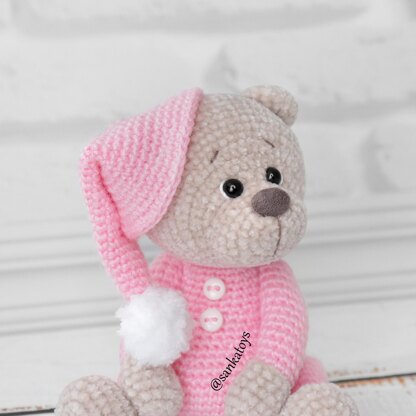 Plush bear in sleepwear