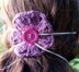 Crochet flower to hold facemask in place