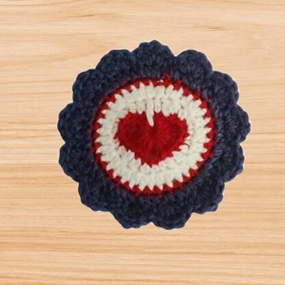 Crochet round coaster with heart